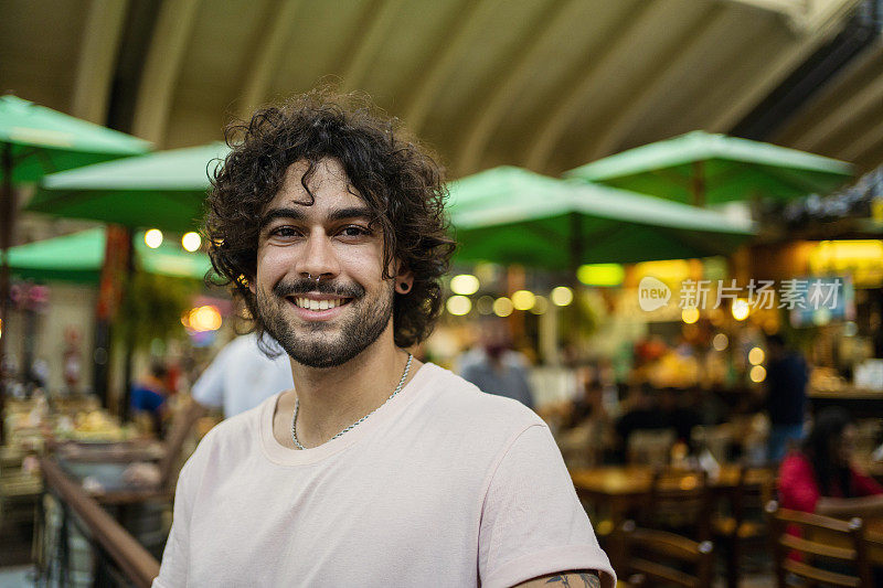 Portrait of  beautiful man at municipal market of São Paulo